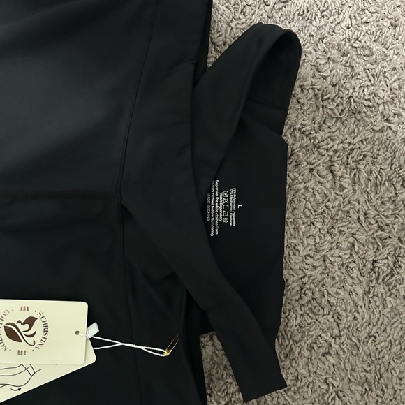 Women's S. Christina Black Leggings w/ sides cut out.  NWT-Size Large - Picture 2 of 2